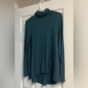 Light, Loose fitting turtleneck top, very pretty color!